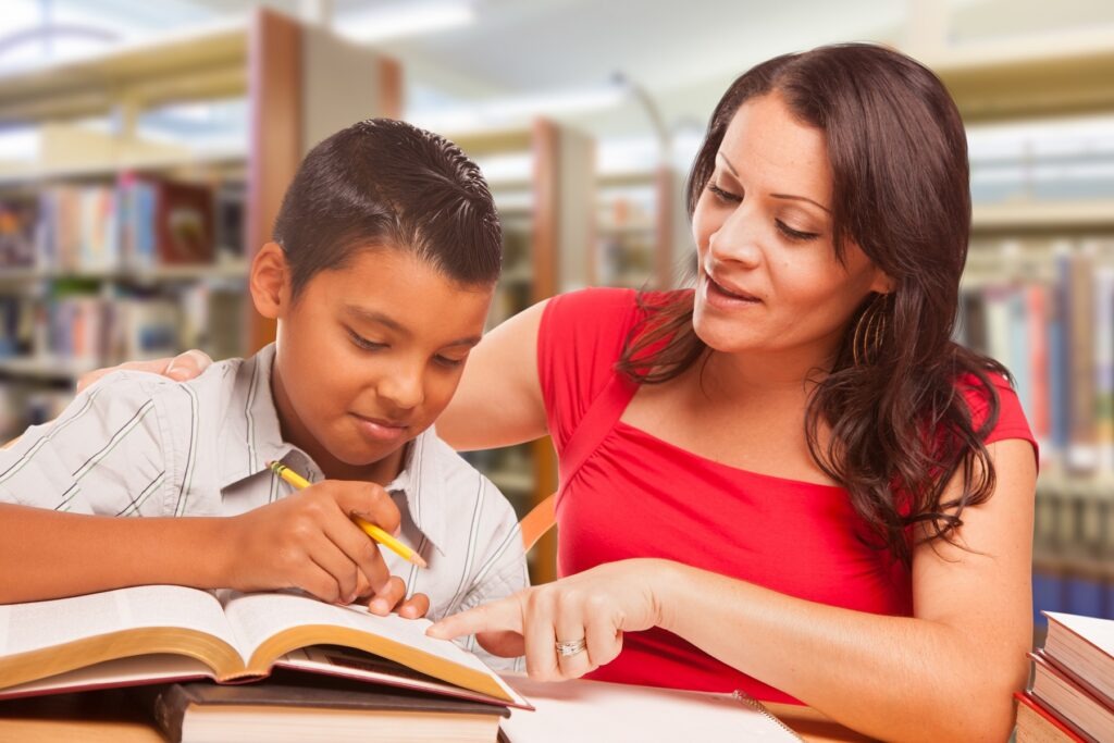 woman math tutoring boy at doral florida library